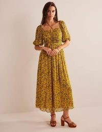 Boden Halterneck Detail Maxi Dress in Mustard Seed, Meadow Fall / dark yellow floral print dresses / ruched bodice / puff sleeve clothing / strappy halter neck