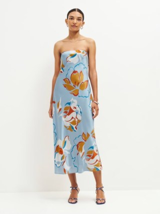 Reformation Joana Silk Dress in Hyperion – blue silky strapless midi dresses with bold floral prints – luxury bandeau fashion – feminine occasion clothing – elegant summer event clothes