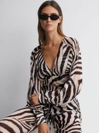 REISS FARLEY ZEBRA PRINT CROPPED PLUNGE NECK BLOUSE in BLACK/WHITE – glamorous monochrome blouses – women’s clothes with animal prints – holiday clothing with plunging neckline – blouson sleeve tops