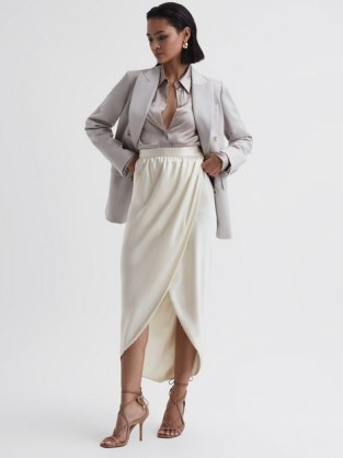 Reiss TYRA SILK HIGH-LOW WRAP SKIRT in Ivory – luxe silky occasion skirts – high low hem – asymmetric hemline – luxury occasionwear – women’s drapey event clothes