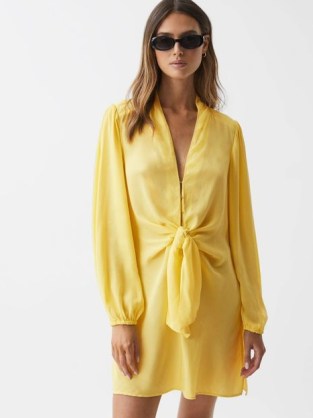 Reiss MABEL TIE FRONT MINI DRESS in YELLOW – long sleeve knot detail dresses – women’s vibrant resort wear - flipped