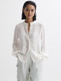 REISS MAISIE COLLARLESS LONG SLEEVE LACE BLOUSE in CREAM – cut out detail blouses with balloon sleeves – feminine voluminous sleeved tops