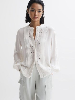 REISS MAISIE COLLARLESS LONG SLEEVE LACE BLOUSE in CREAM – cut out detail blouses with balloon sleeves – feminine voluminous sleeved tops