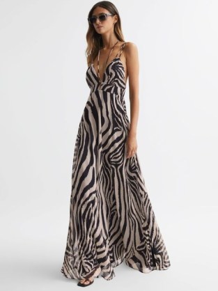 REISS VIDA ZEBRA PRINT MAXI DRESS in BLACK/WHITE – glamorous evening resort clothes – strappy occasion dresses with animal prints – plunge front event clothing – cut out back fashion