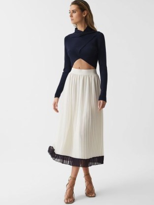 Reiss OSTI PLEATED MIDI SKIRT in White – lightweight colour block hem occasion skirts – women’s summer occasionwear - flipped