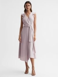 REISS WILLOW WRAP TIE MIDI DRESS LILAC ~ asymmetric dresses with flutter sleeve detail ~ short ruffled sleeves ~ asymmetrical summer occasion clothes