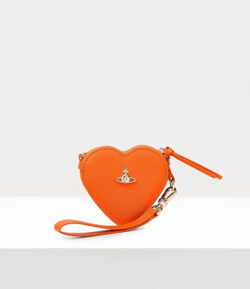 Vivienne Westwood SAFFIANO HEART WRISTLET in ORANGE / small leather wrist bags - flipped