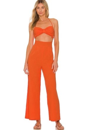 x REVOLVE Boat Linen Jumpsuit in Tangerine / orange front cut out halterneck jumpsuits / vibrant all-in-one summer fashion / cutout holiday clothes / strappy halter neck clothing - flipped