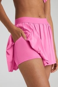 alo yoga VARSITY TENNIS SKIRT in PARADISE PINK ~ pleated sports skirts with built in shorts ~ women’s sportwear clothes