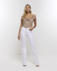 River Island WHITE MID RISE FLARE JEANS | summer denim clothing | casual warm weather fashion | women’s flares | flared jean