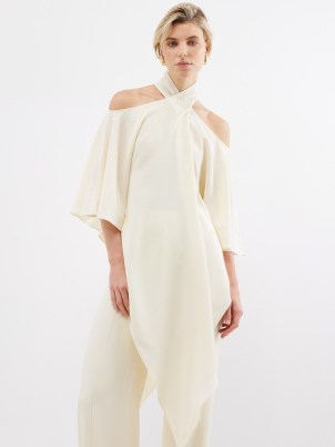 TALLER MARMO Sade off-the-shoulder pointed-hem crepe top ~ fluid ivory asymmetric hemline tops ~ chic asymmetrical occasion clothes - flipped