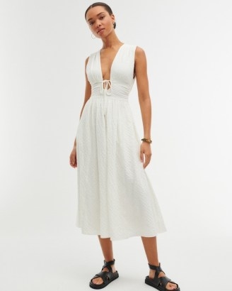 Abercrombie & Fitch Seersucker Ruched Midi Dress in White | sleeveless plunge front dresses | summer fashion with plunging V-neckline | fitted bodice with tie detail - flipped