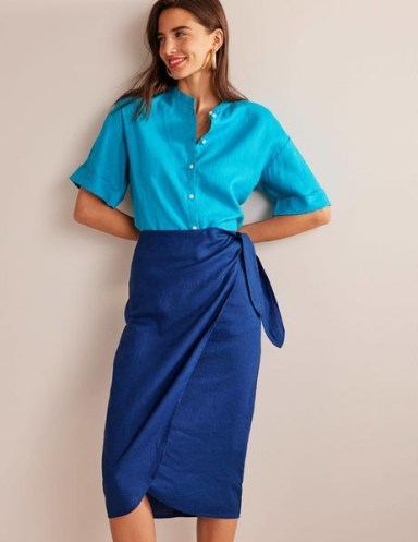 Boden Wrap-Front Linen Midi Skirt in Sapphire / women’s chic blue summer skirts / side tie detail