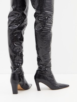 KHAITE Marfa crocodile-effect leather over-the-knee boot in black – glossy animal print high boots