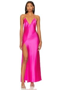 DANNIJO Halter Maxi Dress in Hot Fuschia | strappy pink silk thigh high split hem dresses | skinny shoulder strap occasion clothes | plunge front evening fashion | plunging neckline
