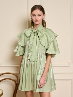 sister jane THE MADELEINE MOMENT Cheri Bow Mini Dress in Pistachio Green ~ shimmering ruffled relaxed fit dresses ~ occasion fashion with an oversized neck tie detail ~ romantic party clothes