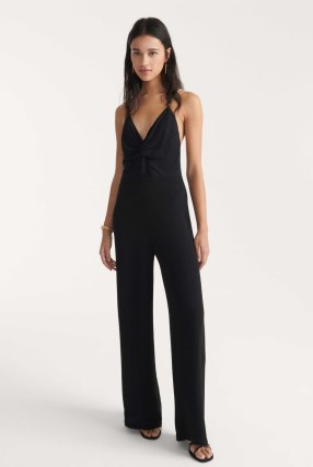 ba&sh FIFIA jumpsuit in Black | strappy plunge front jumpsuits with chain strap back detail | all-in-one party fashion | twist deep V-neckline evening clothes - flipped