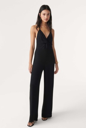 ba&sh FIFIA jumpsuit in Black | strappy plunge front jumpsuits with chain strap back detail | all-in-one party fashion | twist deep V-neckline evening clothes