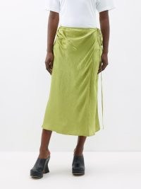 ACNE STUDIOS Iala satin midi skirt in green / fluid wrap skirts with a textured crease finish