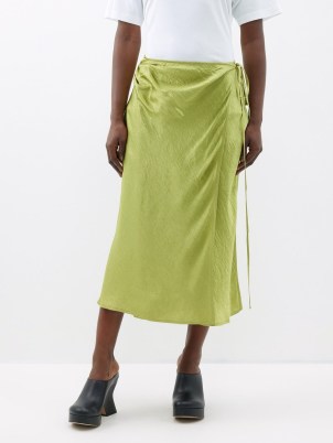 ACNE STUDIOS Iala satin midi skirt in green / fluid wrap skirts with a textured crease finish