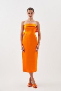 KAREN MILLEN Italian Satin Bandeau Structured Bow Detail Midi Dress in Tangerine / strapless orange dresses / silky smooth fabric occasionwear