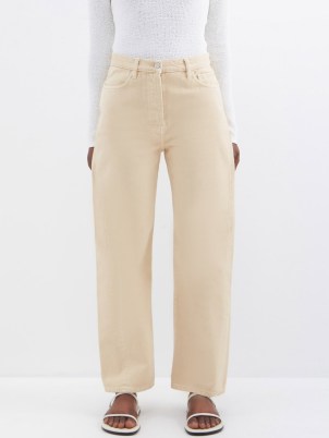 TOTEME Twisted-seam wide-leg jeans in Cream ~ women’s organic cotton relaxed fit jean - flipped