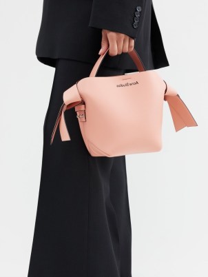 ACNE STUDIOS Musubi mini leather cross-body bag in pink ~ luxe top handle bags ~ luxury crossbody handbag - flipped