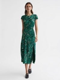 REISS LIVIA PRINTED CUT OUT FITTED MIDI DRESS in Green