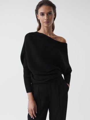 Reiss LORNA ASYMMETRIC DRAPE KNITTED TOP in BLACK | women’s tops with an asymmetrical neckline | chic knitwear clothing - flipped