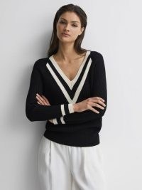 Reiss MATILDA CASUAL RIBBED COLOURBLOCK JUMPER in BLACK / WHITE | women’s V-neck colour block jumpers | rib knit monochrome sweater