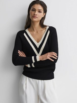 Reiss MATILDA CASUAL RIBBED COLOURBLOCK JUMPER in BLACK / WHITE | women’s V-neck colour block jumpers | rib knit monochrome sweater