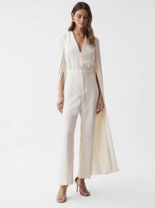 REISS OLIVIA CAPE SLEEVE V-NECK JUMPSUIT in IVORY ~ occasion jumpsuits ~ statement occasionwear - flipped