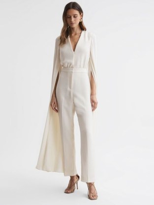 REISS OLIVIA CAPE SLEEVE V-NECK JUMPSUIT in IVORY ~ occasion jumpsuits ~ statement occasionwear