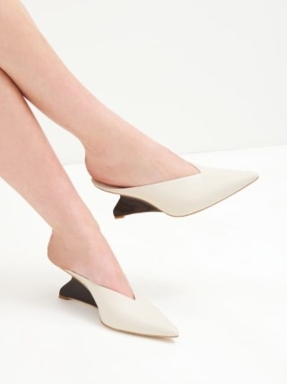 Reformation Wei Pump in Almond | chic wedged shoes | luxury pointed toe wedge heel pumps | contemporary sculpted wedges | luxe shoes - flipped