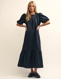 nobody’s child Black Sarah Smock Midi Dress | organic cotton puff sleeve tiered hem dresses | on-trend oversized clothing | relaxed fit fashion