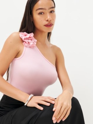 Reformation Camellia Knit Top in Babygirl ~ pink floral one shoulder tops ~ feminine asymmetric clothing ~ asymmetrical fashion ~ women’s clothes with flower applique detail - flipped