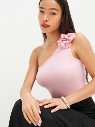Reformation Camellia Knit Top in Babygirl ~ pink floral one shoulder tops ~ feminine asymmetric clothing ~ asymmetrical fashion ~ women’s clothes with flower applique detail