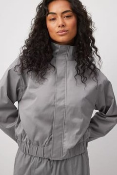 Chloé Schuterman x NA-KD High Neck Bomber Jacket in Grey | women’s casual relaxed fit jackets - flipped