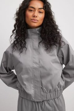 Chloé Schuterman x NA-KD High Neck Bomber Jacket in Grey | women’s casual relaxed fit jackets