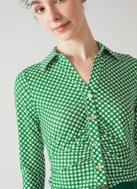 L.K. BENNETT Molly Green And Cream Graphic Spot Print Jersey Top / women’s retro inspired ruched front polka dot shirts / womens 70s vintage style collared tops