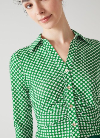 L.K. BENNETT Molly Green And Cream Graphic Spot Print Jersey Top / women’s retro inspired ruched front polka dot shirts / womens 70s vintage style collared tops