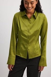 NA-KD Pointy Shoulder Satin Shirt in Green ~ women’s padded shoulder shirts ~ womens clothing made with recycled materials