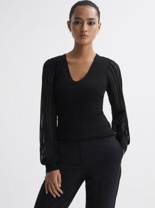 REISS BROOKLYN SHEER SLEEVE V-NECK TOP in BLACK – women’s tops with long drapey sleeves