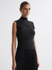 REISS GEORGIA TINSEL KNITTED SLEEVELESS VEST in Black – chic high neck metallic top – women’s sparkle knitwear – sophisticated evening occasion clothing with a touch of shimmer