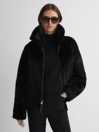 REISS MELODY REVERSIBLE LEATHER SHEARLING ZIP-THROUGH JACKET in BLACK ~ glamorous winter jackets