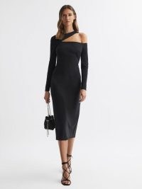 REISS TIFFANY BODYCON OFF-THE-SHOULDER MIDI DRESS in Black – asymmetric cut out occasion dresses – très chic date night clothing – sophisticated cutout special event fashion