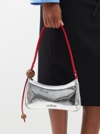 JACQUEMUS Bisou Perle small faux-leather shoulder bag in silver / metallic baguette style bags / shiny 90s inspired handbag / luxe mini handbags