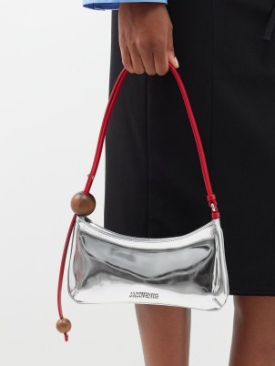 JACQUEMUS Bisou Perle small faux-leather shoulder bag in silver / metallic baguette style bags / shiny 90s inspired handbag / luxe mini handbags