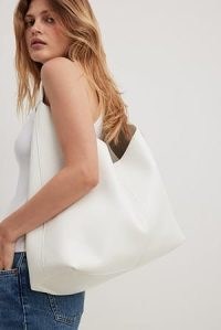 NA-KD Soft Triangular Tote Bag in White | soft slouchy PU shoulder bags
