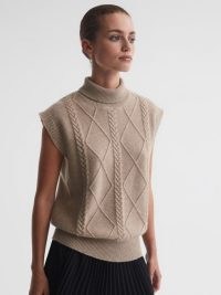 Reiss – CAPOTE MADELEINE THOMPSON CASHMERE WOOL FUNNEL NECK VEST OATMEAL – women’s cap sleeve high neck knitted vests – womens luxe sleeveless funnel neckline sweaters